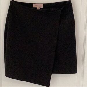 Black asymmetrical miniskirt